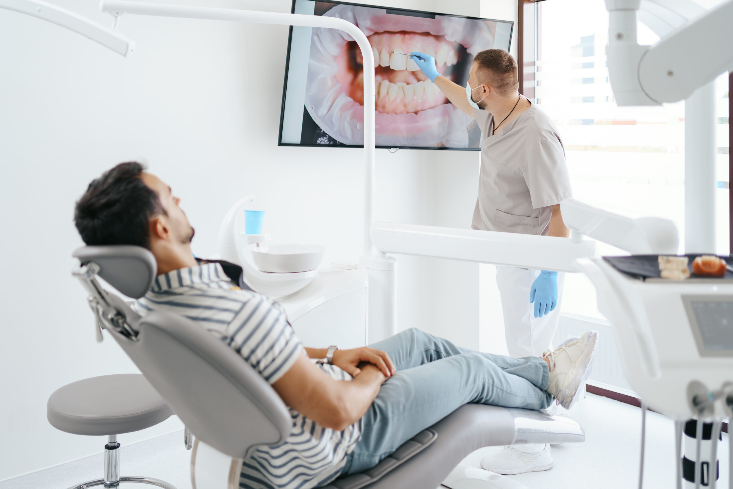 dental care dentist discussing scaled